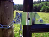 U-Latch installed horizontally on a gate, secured to fence post